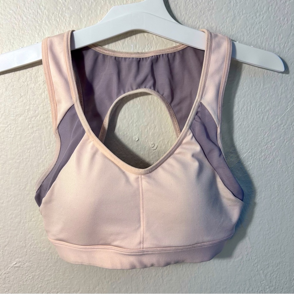pink and purple sports bra